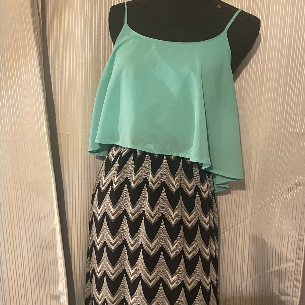 Size large summer dress. Great condition. Purchased from a boutique in Maine.